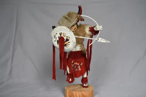 Quauhtemoczin figure, rear view with shield and bow