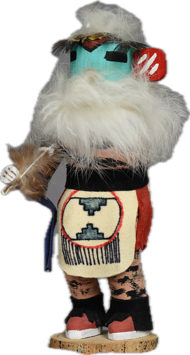 The kachina figure of Serenovento — turquoise mask, white feathered beard, holding a single feather